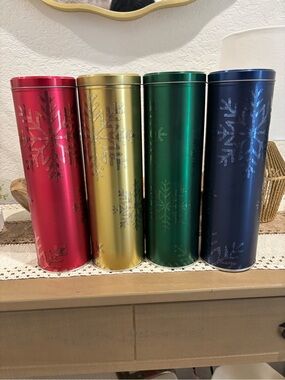 Set of 4 metal Member's Mark shortbread cookie tins with a snowflake design